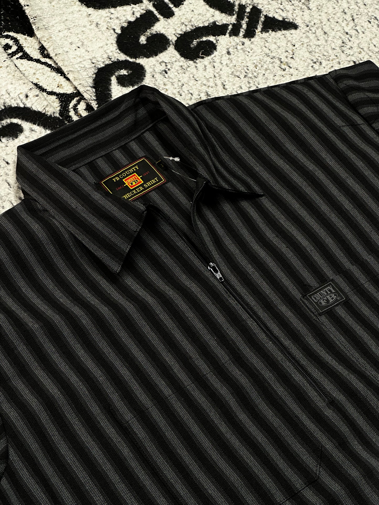 FB COUNTY 1/2 ZIPPER “RAYADA”