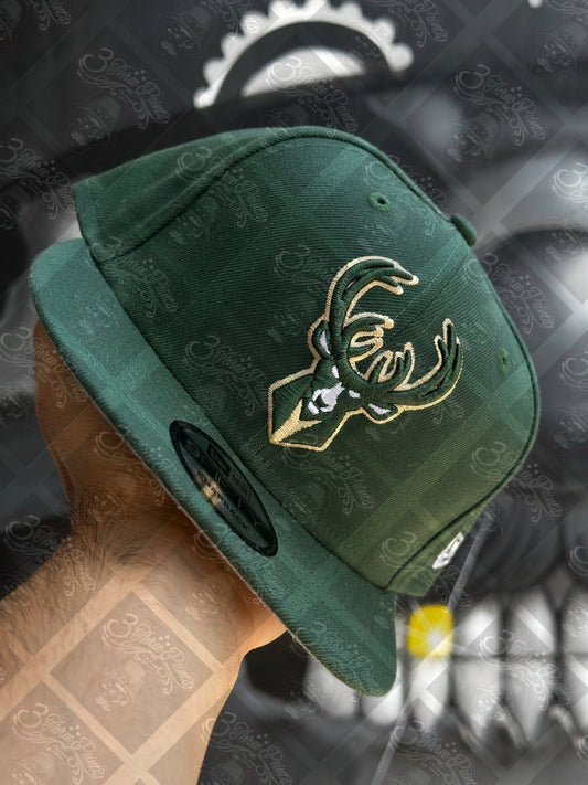 GORRA NEW ERA 9FIFTY SNAPBACK “BUCKS”