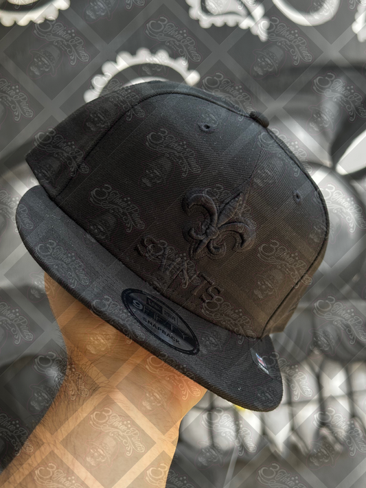 GORRA NEW ERA 9FIFTY SNAPBACK “SAINTS”