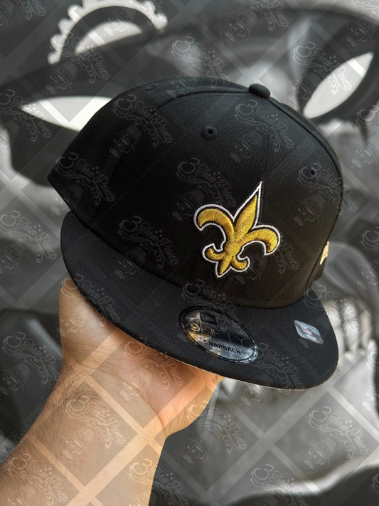 GORRA NEW ERA 9FIFTY SNAPBACK “SAINTS”