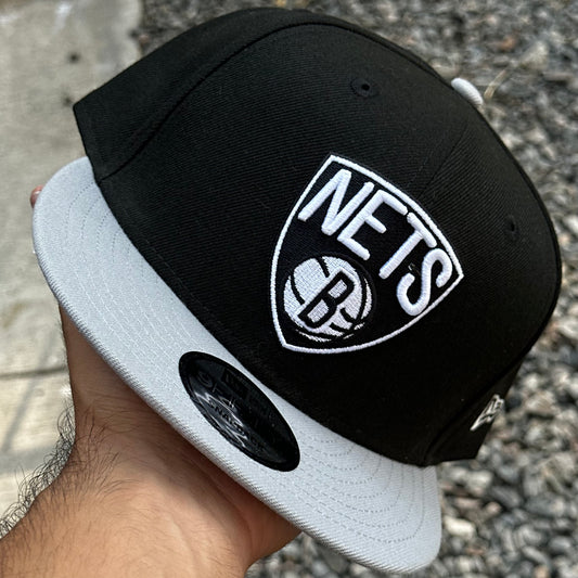 GORRA NEW ERA 9FIFTY SNAPBACK. “NETS”