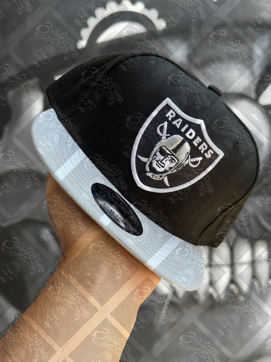 GORRA NEW ERA 9FIFTY SNAPBACK “RAIDERS”