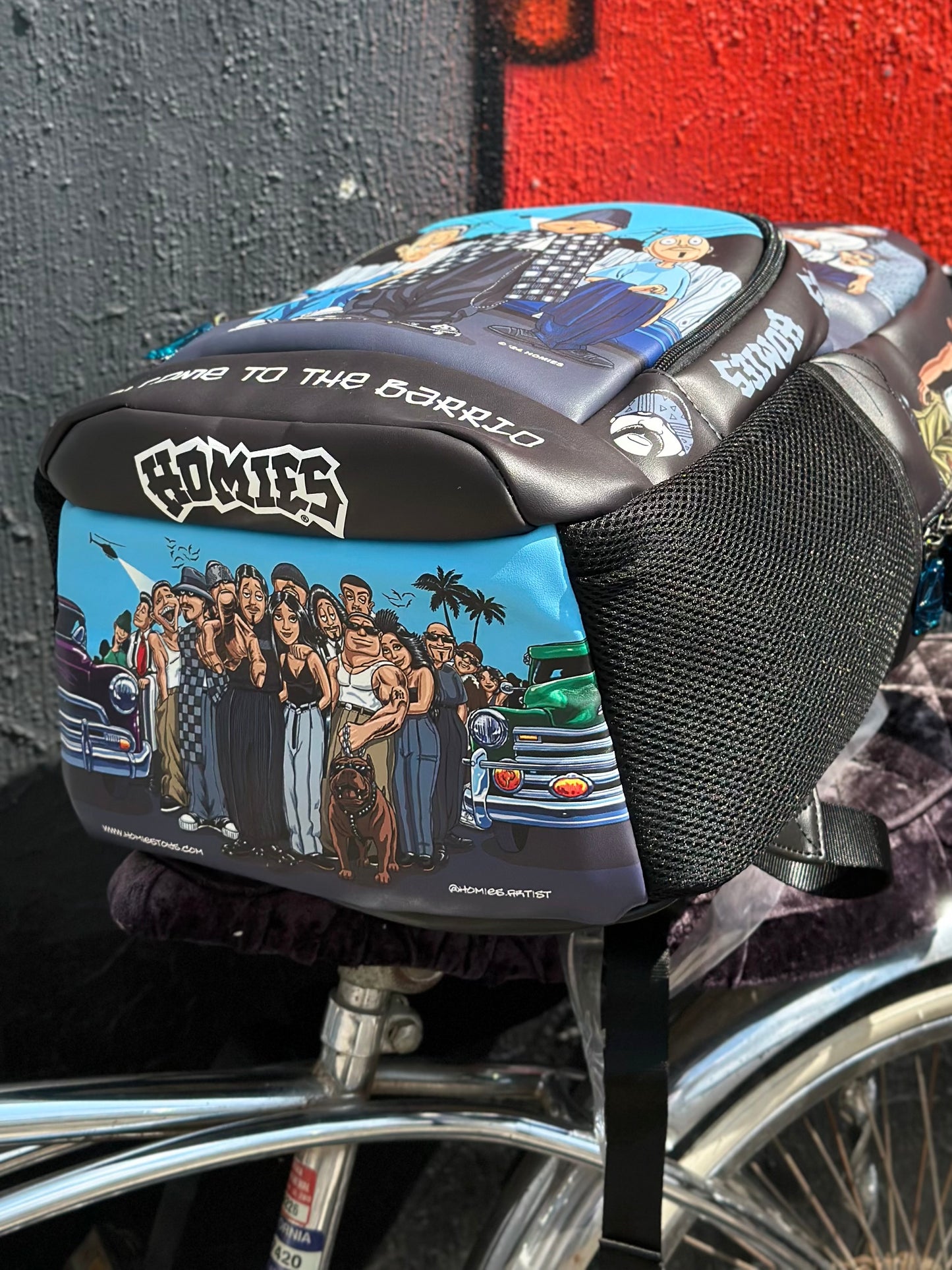 MOCHILA HOMIES X DGA “WELCOME TO THE BARRIO”